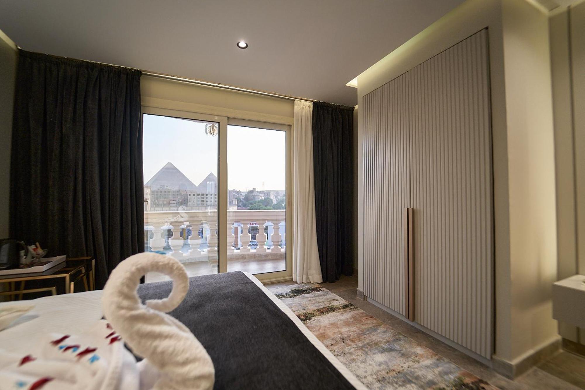 Pyramids Charm Hotel Al Kawm al Akhdar Bagian luar foto