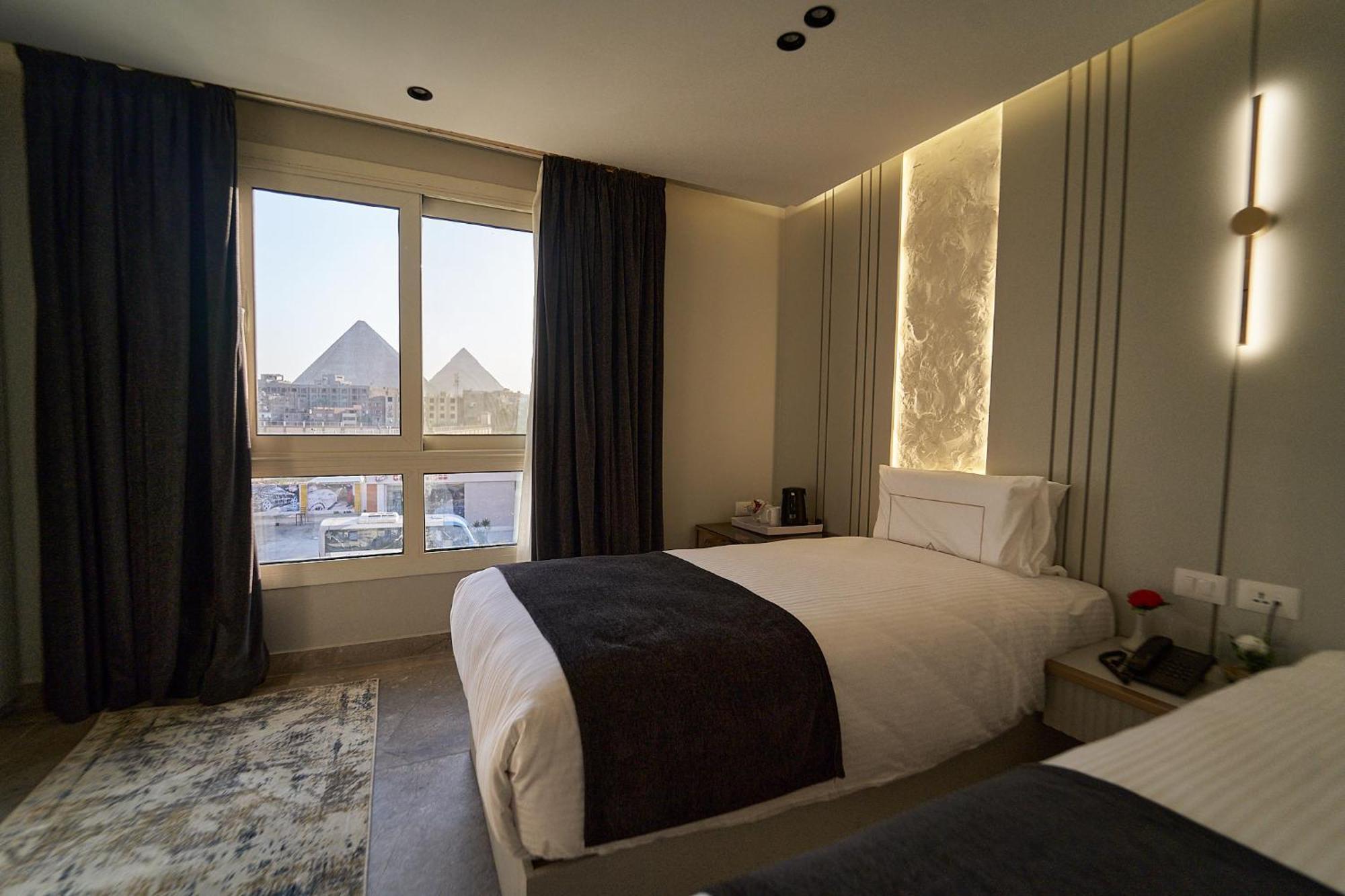 Pyramids Charm Hotel Al Kawm al Akhdar Bagian luar foto