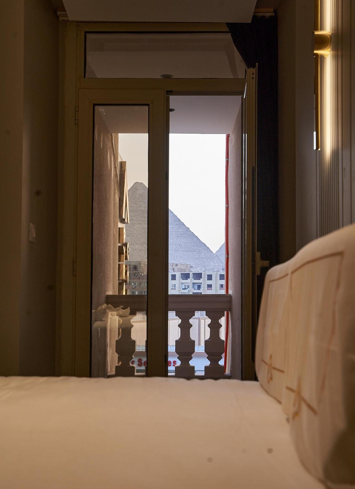 Pyramids Charm Hotel Al Kawm al Akhdar Bagian luar foto