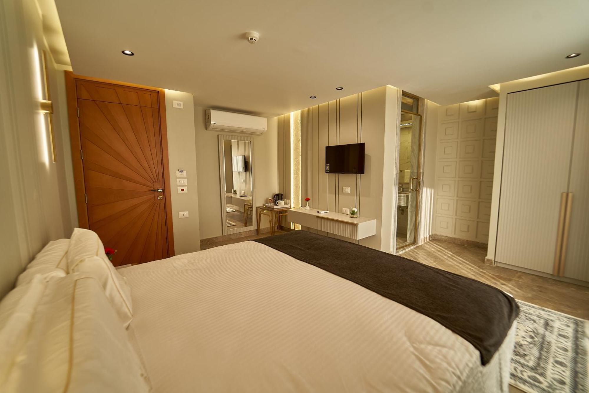 Pyramids Charm Hotel Al Kawm al Akhdar Bagian luar foto