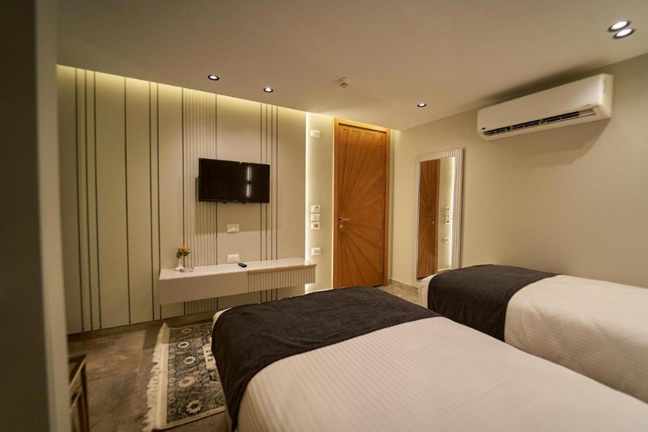 Pyramids Charm Hotel Al Kawm al Akhdar Bagian luar foto